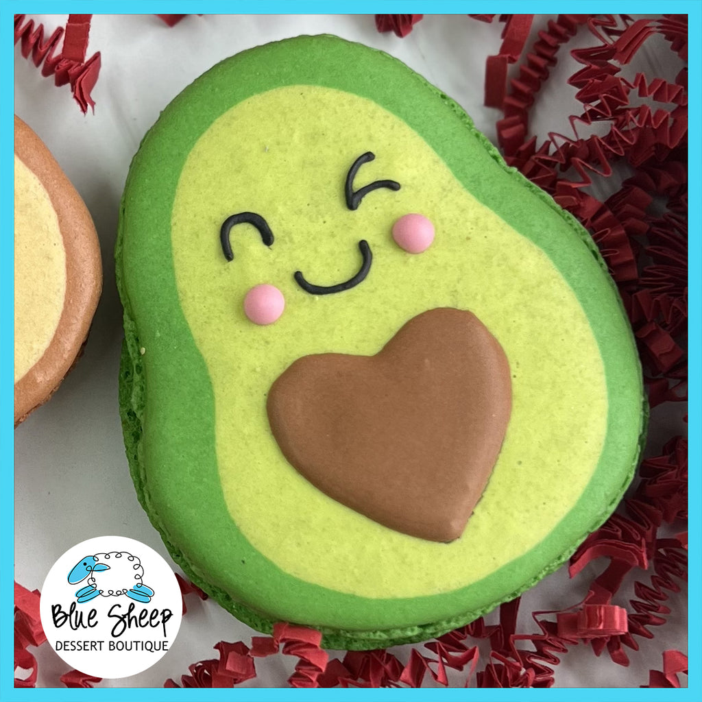 NJ giant French macaron shaped like an avocado, with a heart for a pit. Designed for Valentine's Day