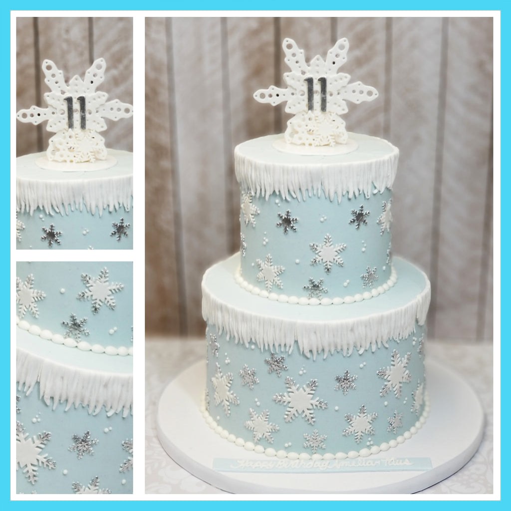 Blue buttercream winter wonderland snowflake cake