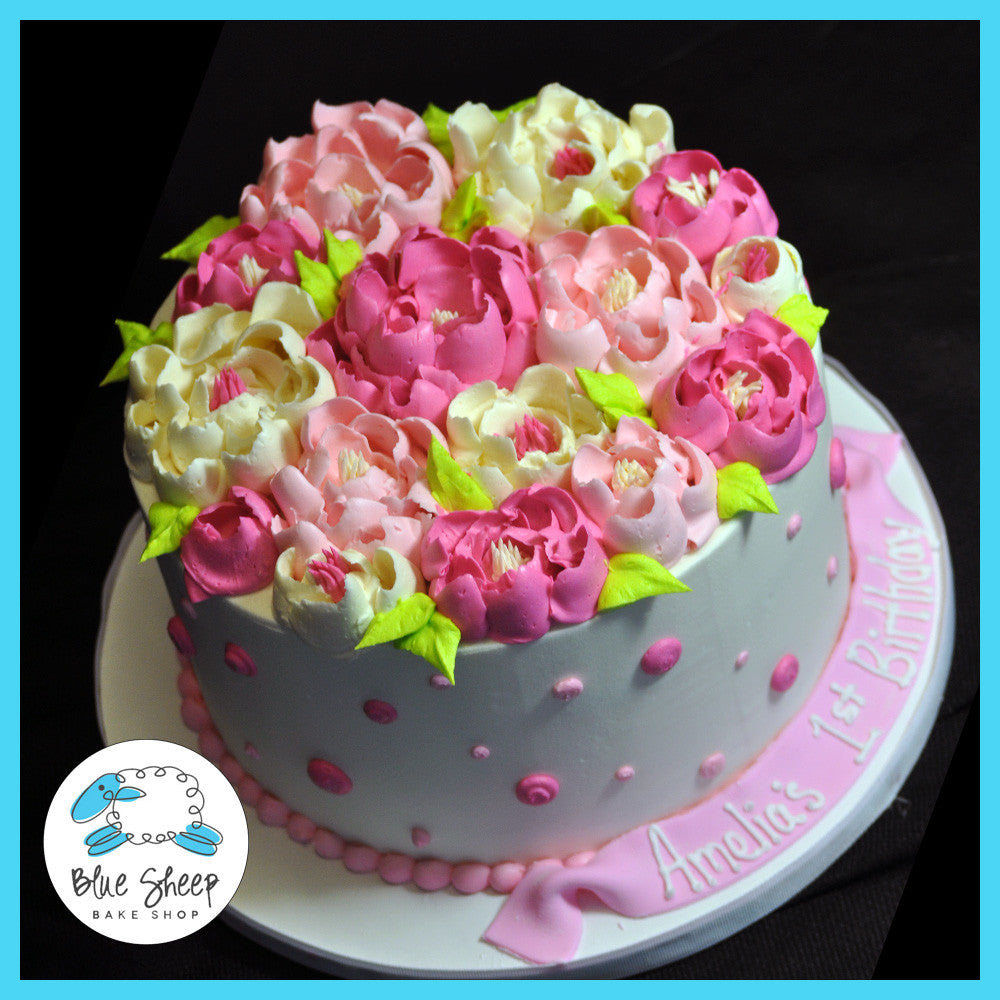 buttercream polka dots and flowers birthday cake