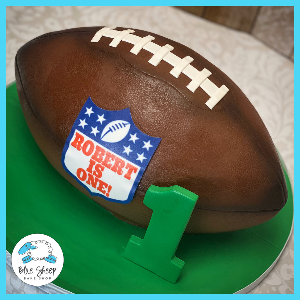 Custom fondant football shaped 1st birthday cake custom cakes nj