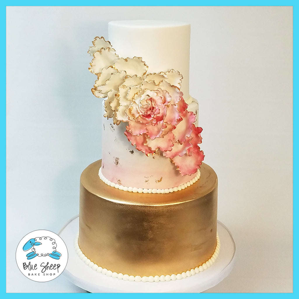 pink and gold wedding cake with peony nj