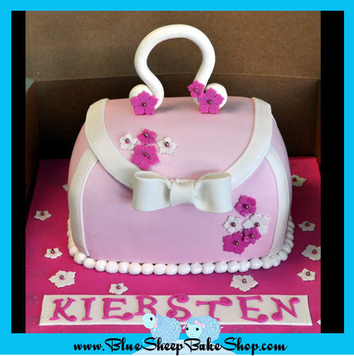 pink purse cake birthday cak