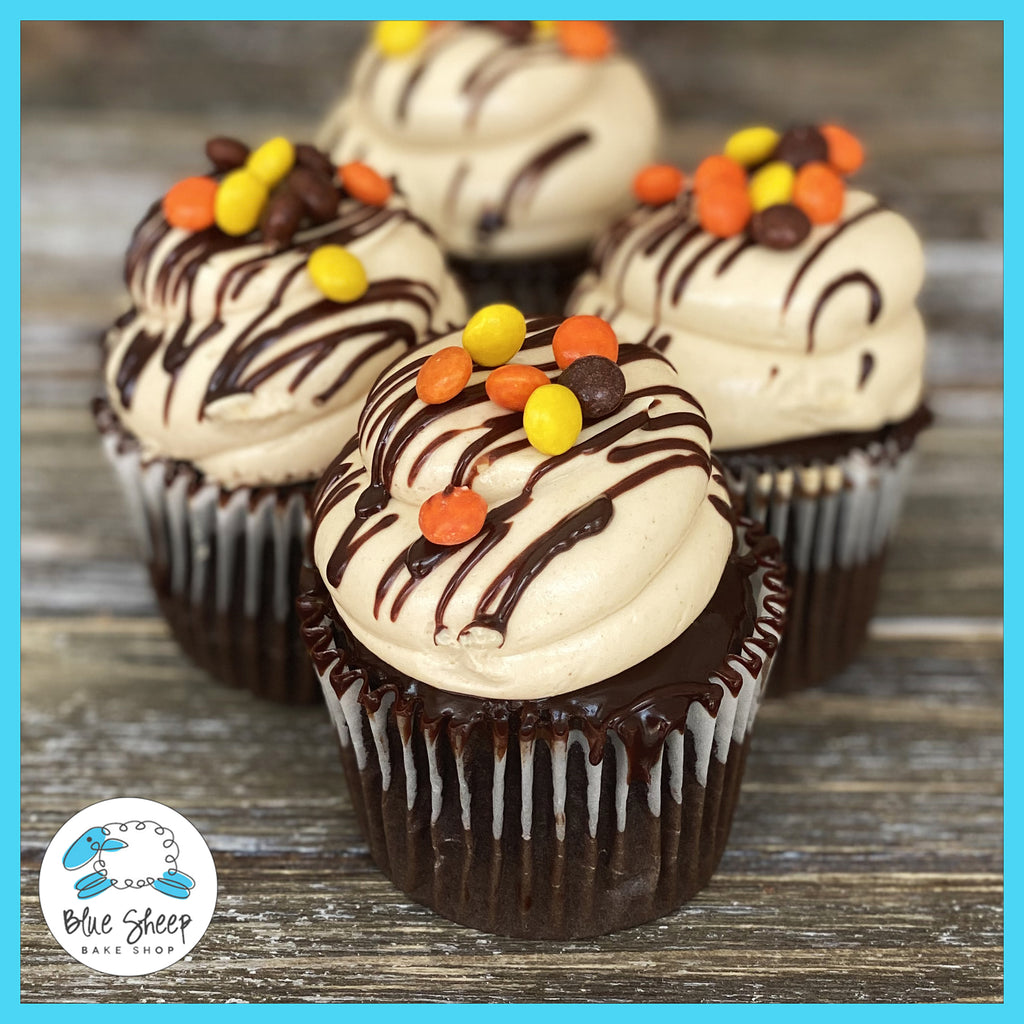 Chocolate cupcakes with Reese's peanut butter filling and ganache topping