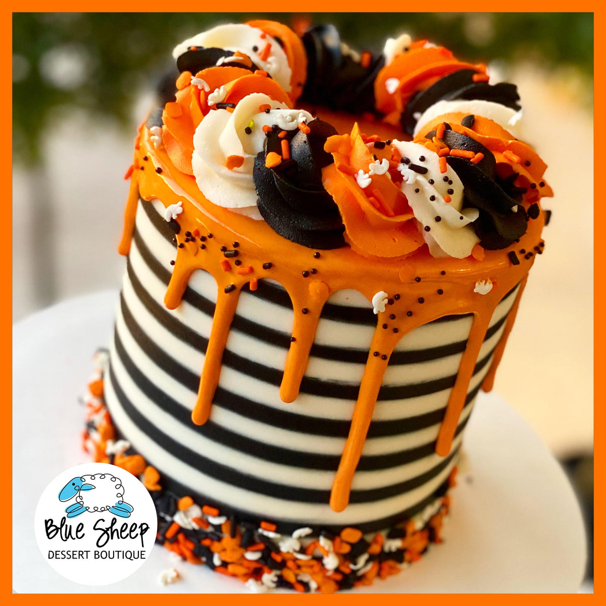Orange, Black, & White Halloween To Go Cake Blue Sheep Bake Shop