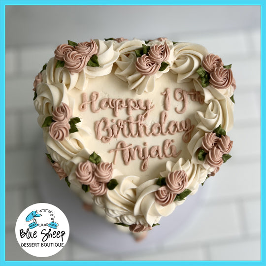 vintage rose buttercream heart cake with rose details