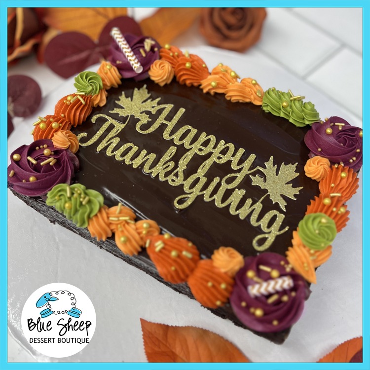 Thanksgiving brownie slab cake topped with chocolate ganache and fall buttercream swirls — perfect for holiday preorders from Blue Sheep Bake Shop in Somerville NJ.