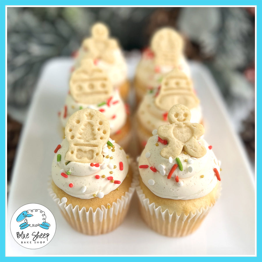 Christmas Cookie Crunch Cupcakes with fluffy vanilla cake, buttercream frosting, holiday sprinkles, and mini Christmas cookie toppers, perfect for holiday celebrations.