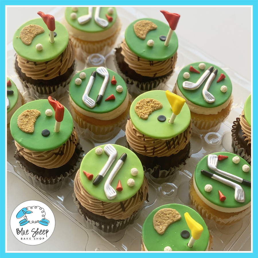 Golf-themed cupcakes with fondant golf clubs, flags, and sand traps from Blue Sheep Bake Shop in Somerville NJ