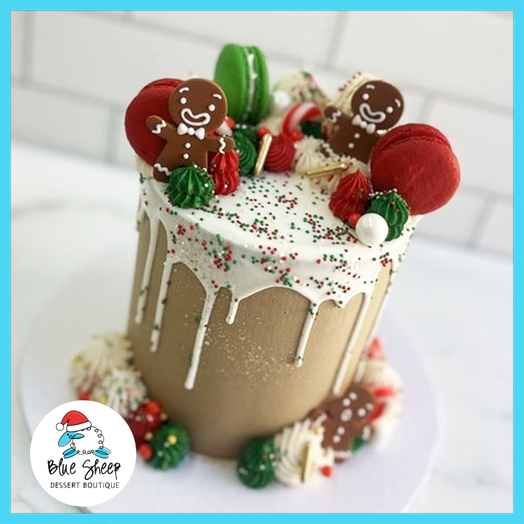 Jolly Gingerbread Christmas Cake decorated with gingerbread cookies, red and green macarons, holiday sprinkles, and white chocolate drip — Blue Sheep Bake Shop Somerville NJ