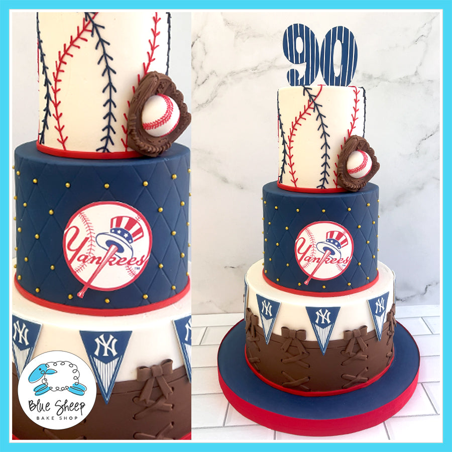 Custom NY Yankees-themed 90th birthday cake with baseball stitching, quilted designs, Yankees logos, and a glove topper by Blue Sheep Bake Shop in Somerville, NJ.