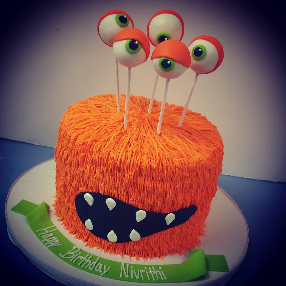 orange monster halloween cake 