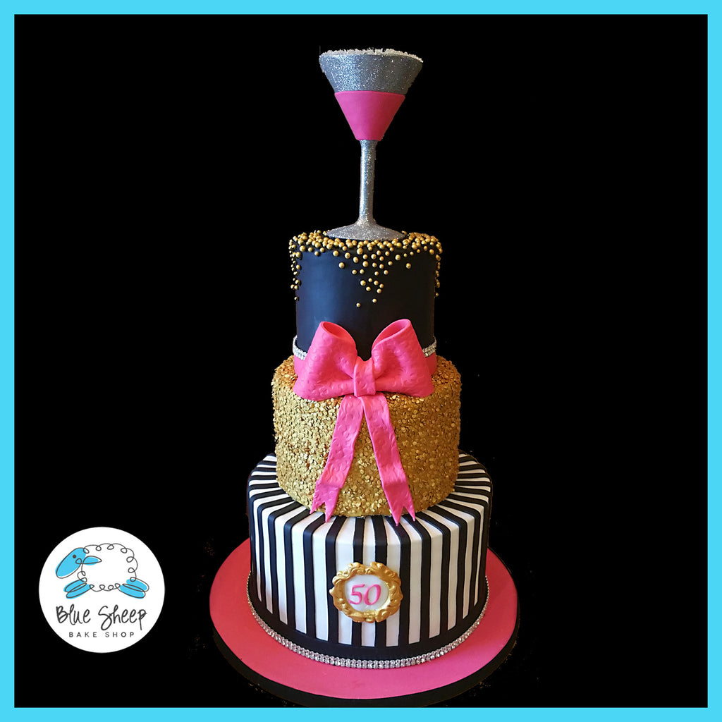 pink back and gold fondant 50th birthday cake