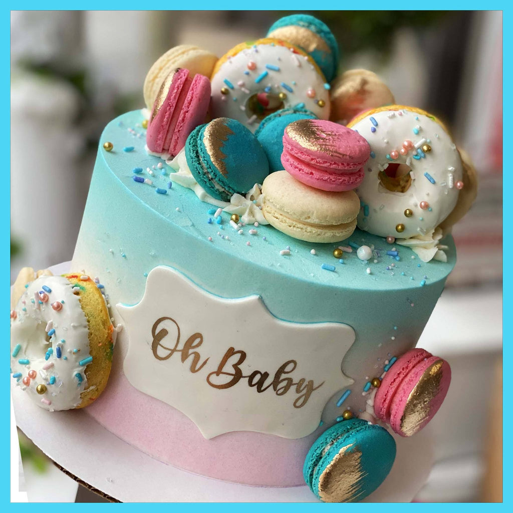 oh baby pink and blue donut macaron cake