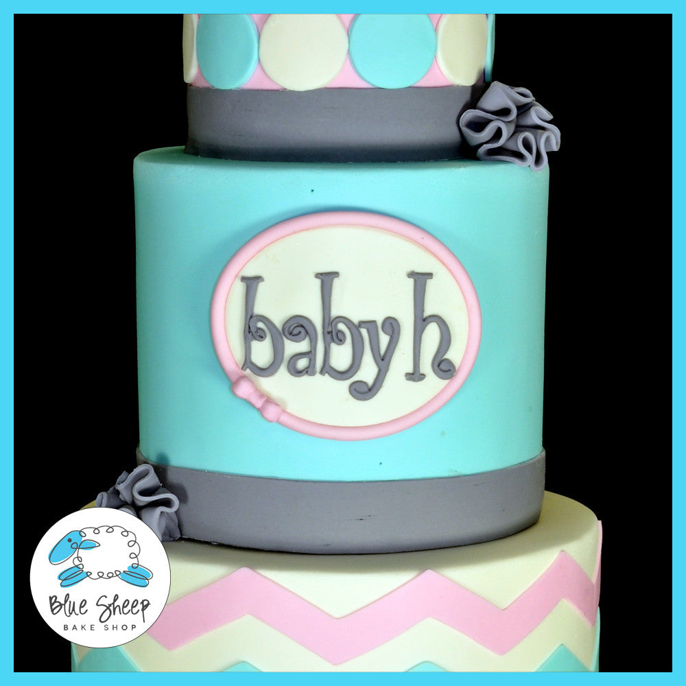 pink blue and grey baby shower cake
