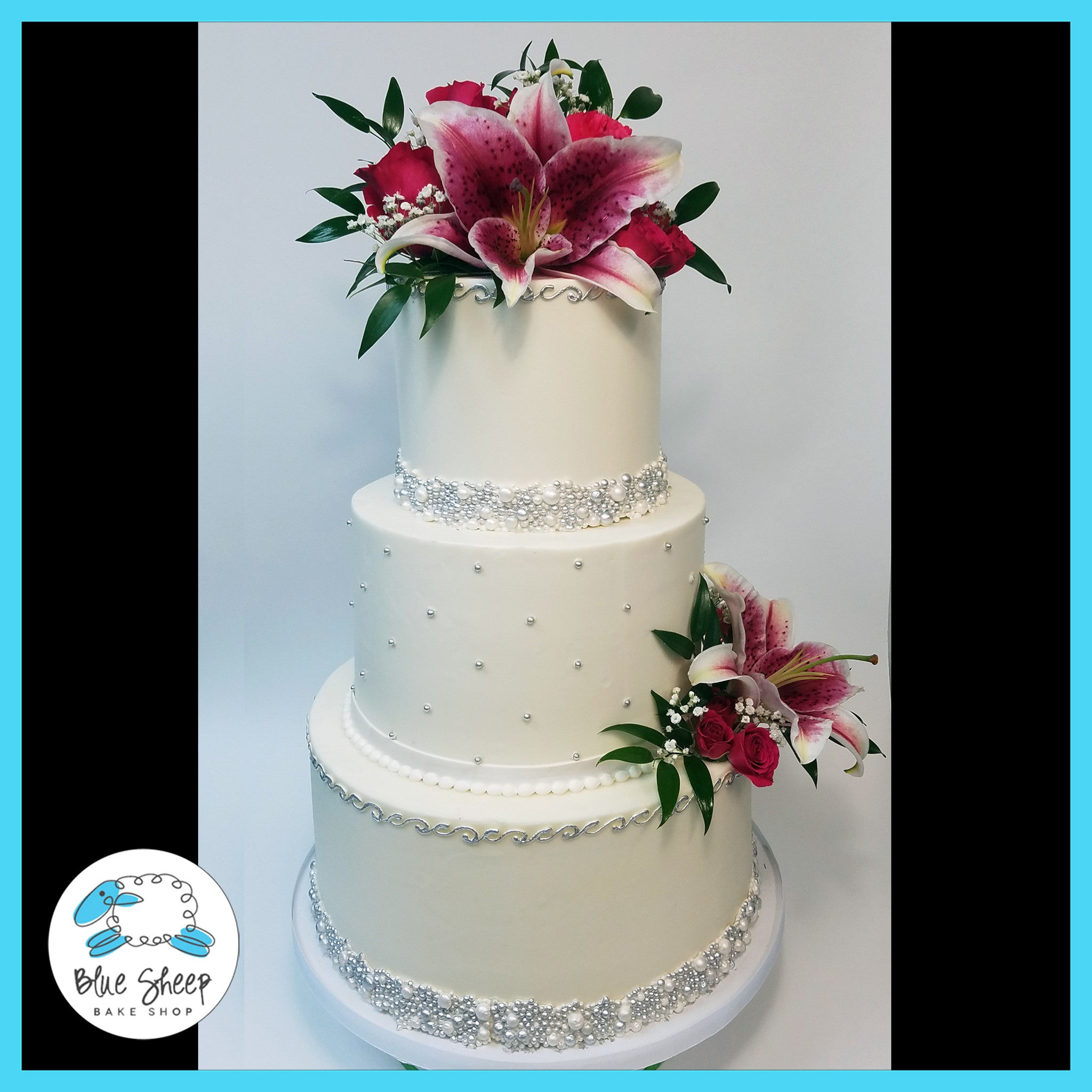 wedding cake with tiger lilies Pearls and Fresh Bloom Tiger Lilies Buttercream Wedding Cake