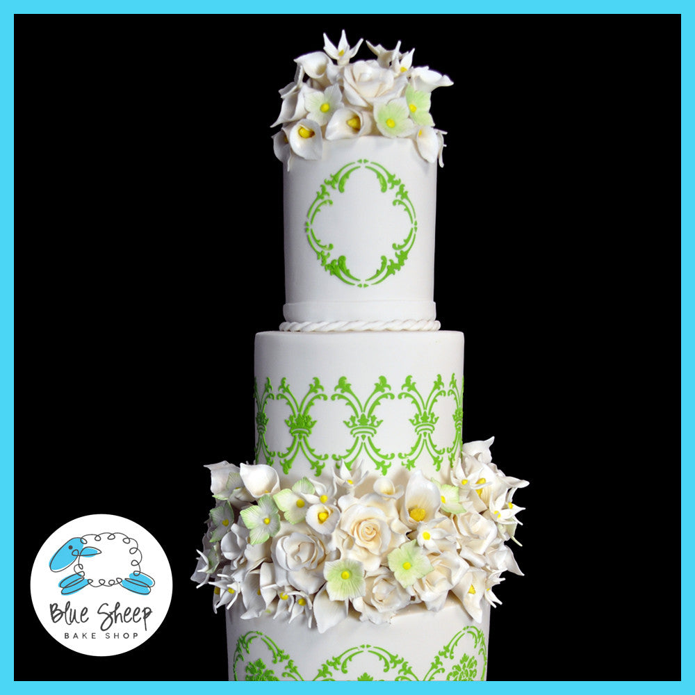 damask wedding cake with roses, calla lillies, and hydrangea