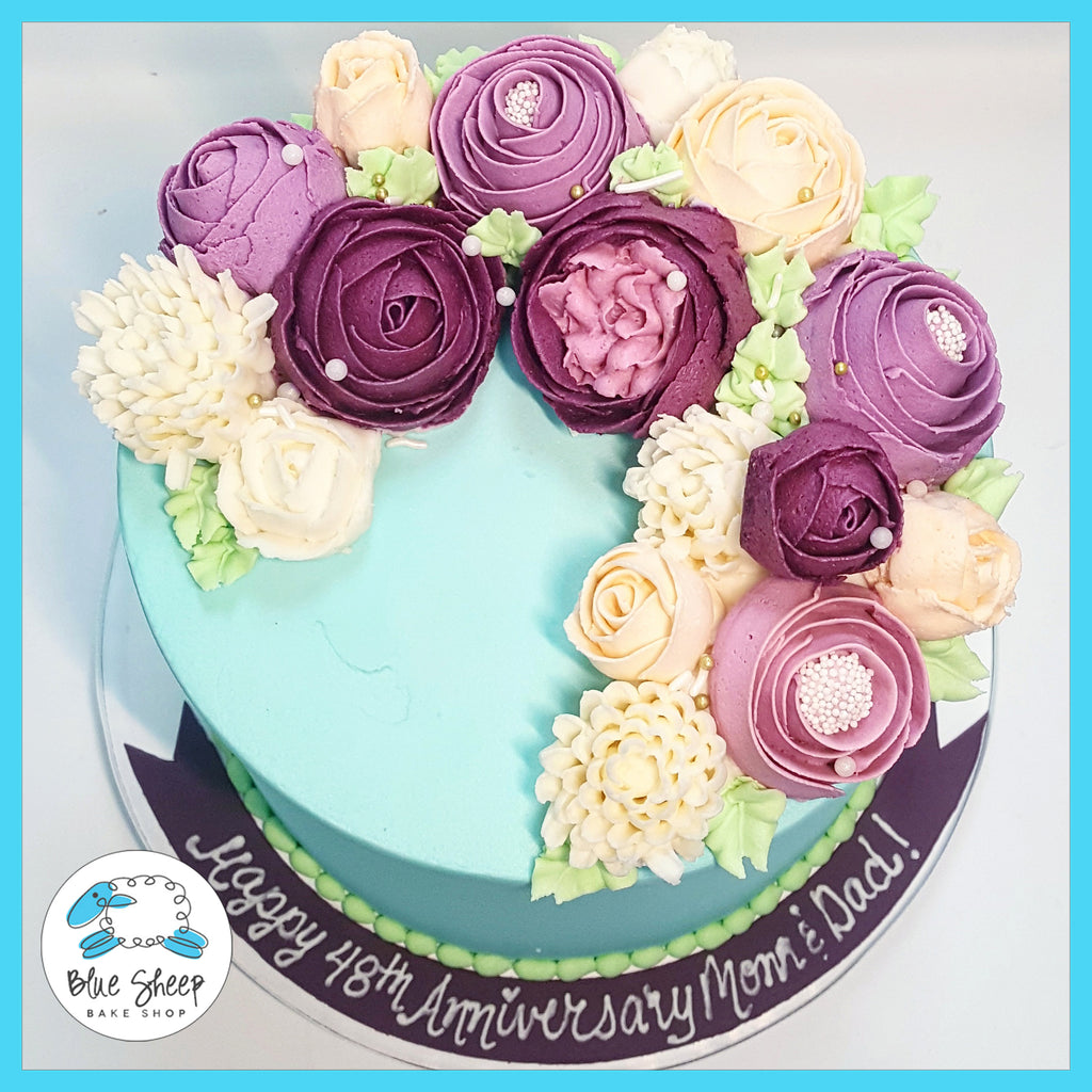 turquoise and purple buttercream floral cake nj