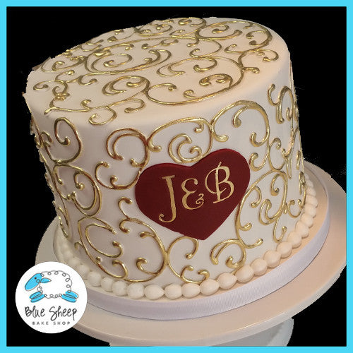 Gold Flourish Engagement Cake