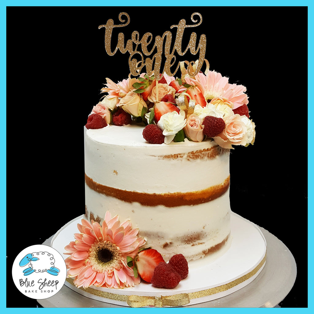 naked cake with flowers and berries nj