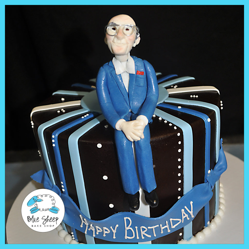 Brown & Blue Birthday Cake With Figure Topper