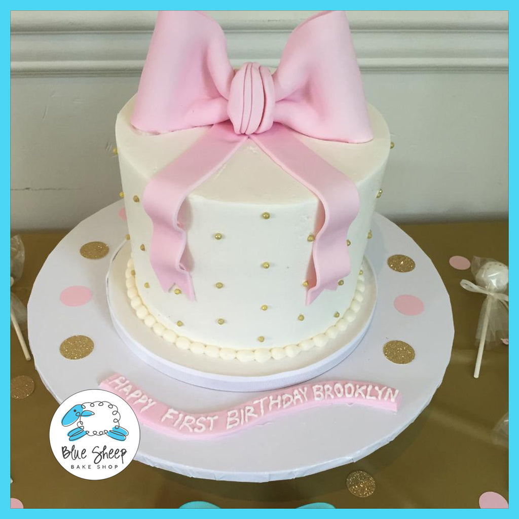 brooklyn's pink and gold buttercream birthday cake