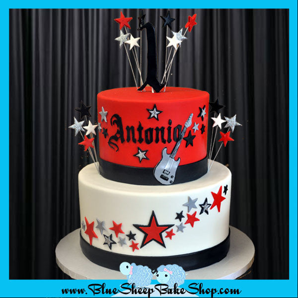 rockstar 1st birthday cake - red, black, white and silver rockstar cake with stars, guitar and gothic lettering
