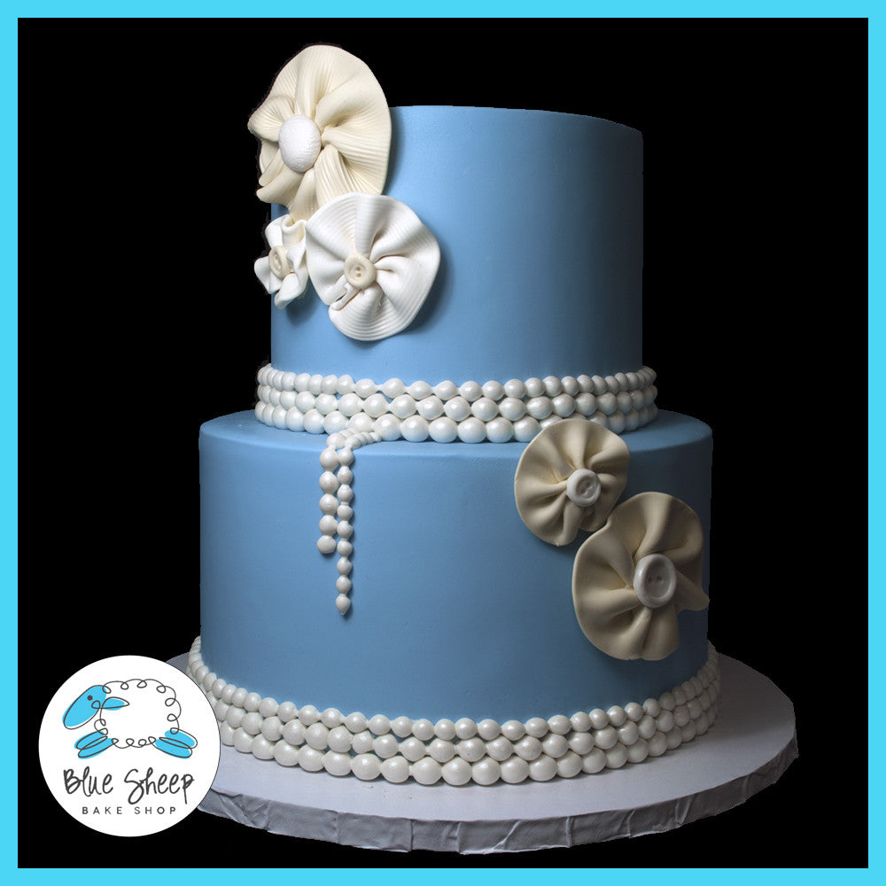 blue vintage pearls and fabric flowers 90th birthday cake