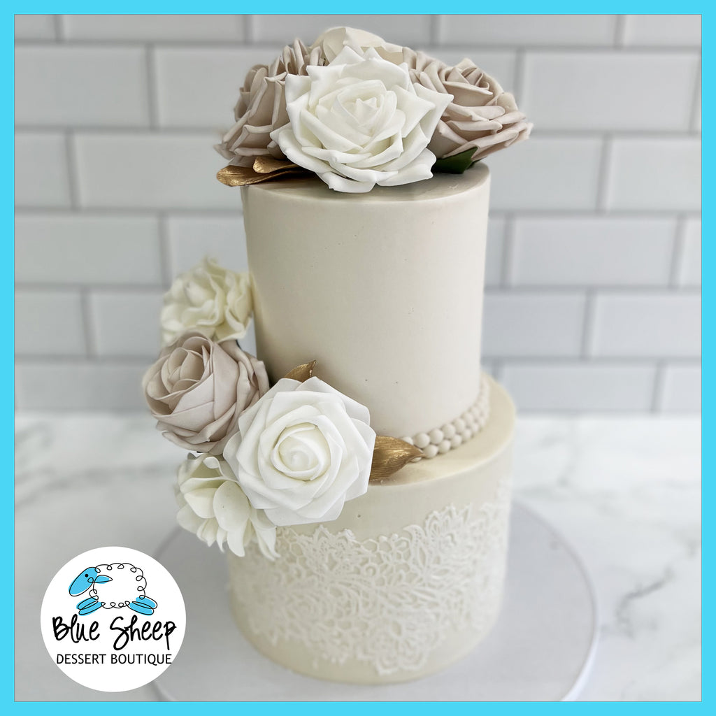 chapagne & roses custom buttercream cake