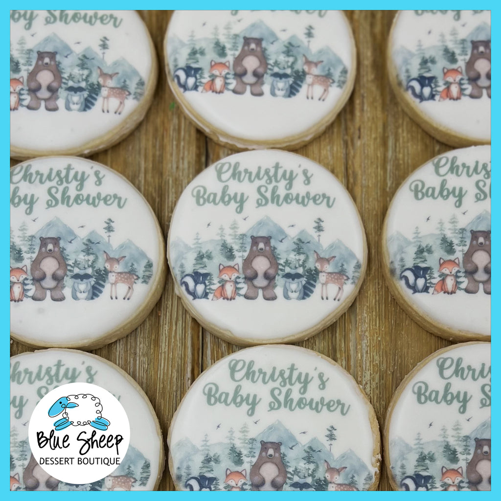 NJ baby shower printed cookie favors, with a woodland animal theme, including a skunk, fox, bear, raccoon, and deer.