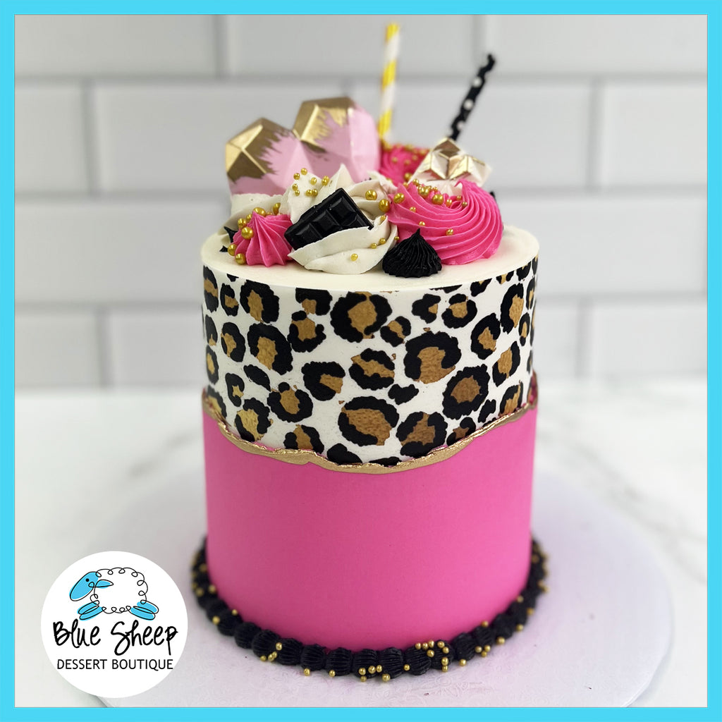 birthday cake with hot pink and leopard design 