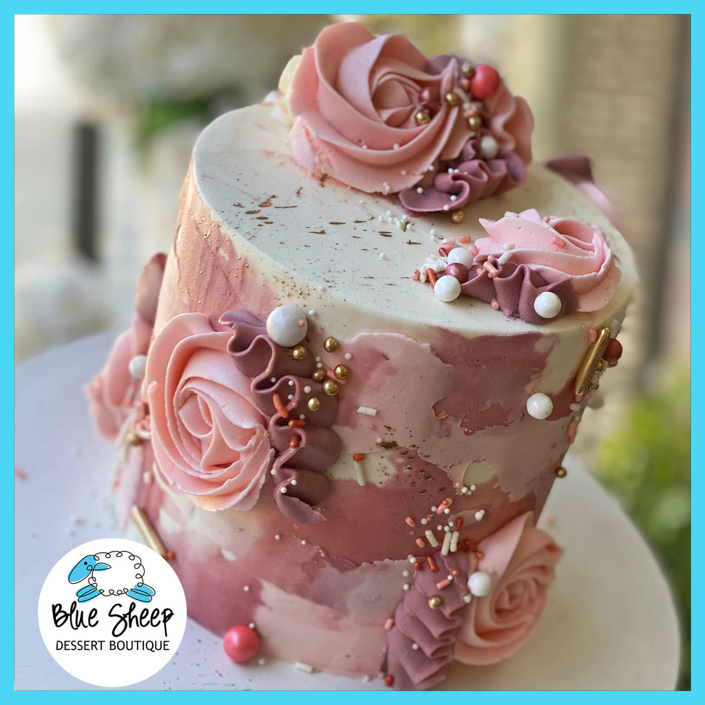 mauve ribbon rosette cake