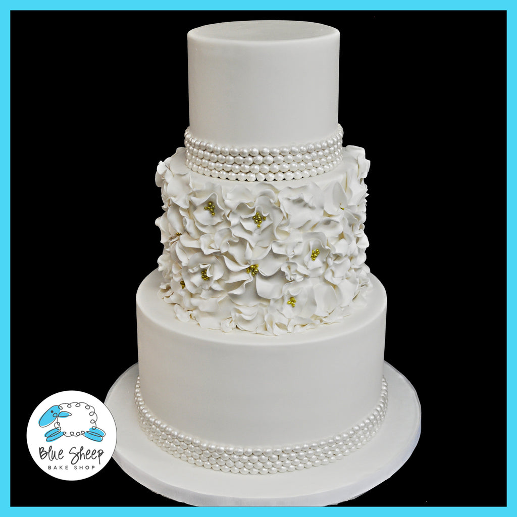 ruffled floral wedding cake