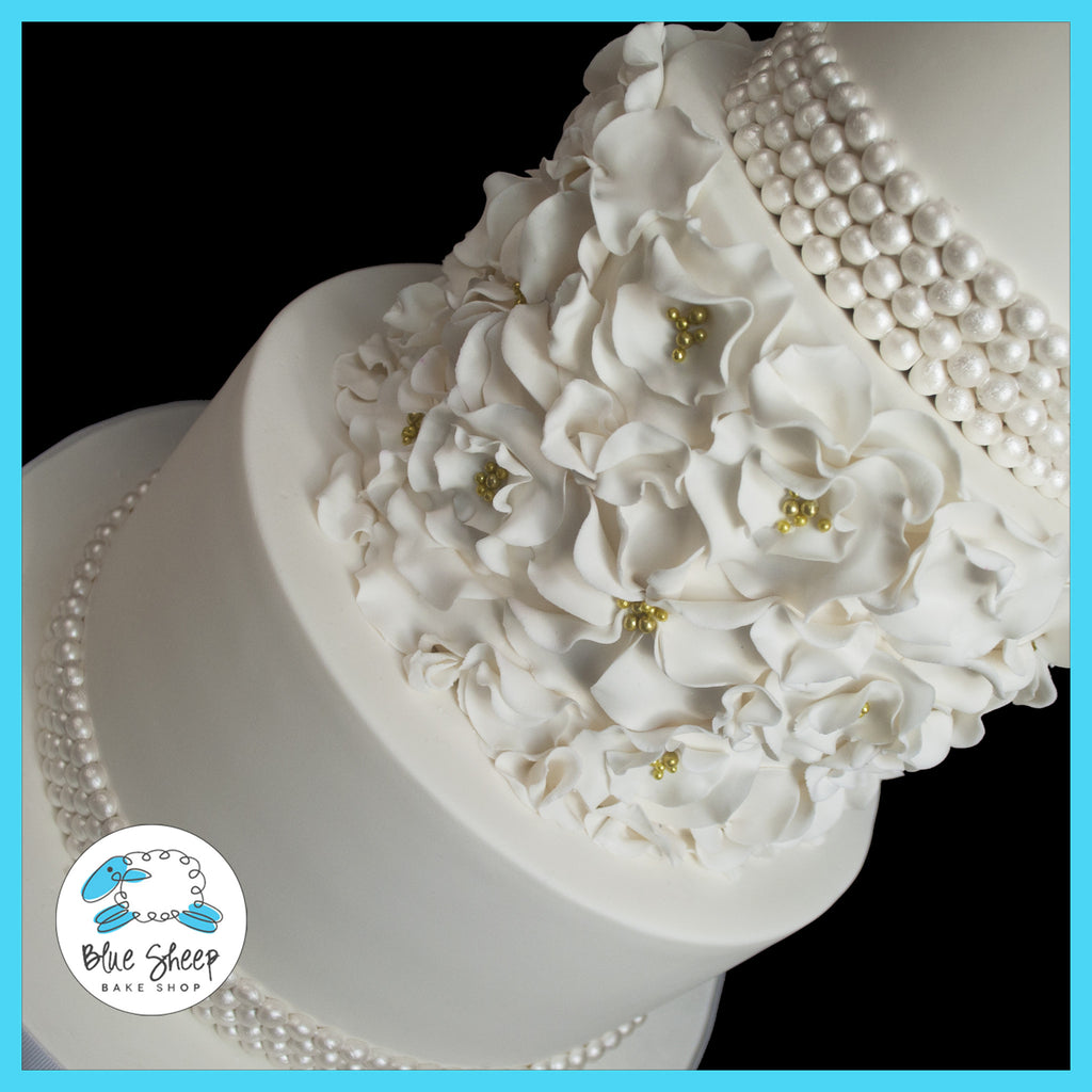 ruffled floral wedding cake